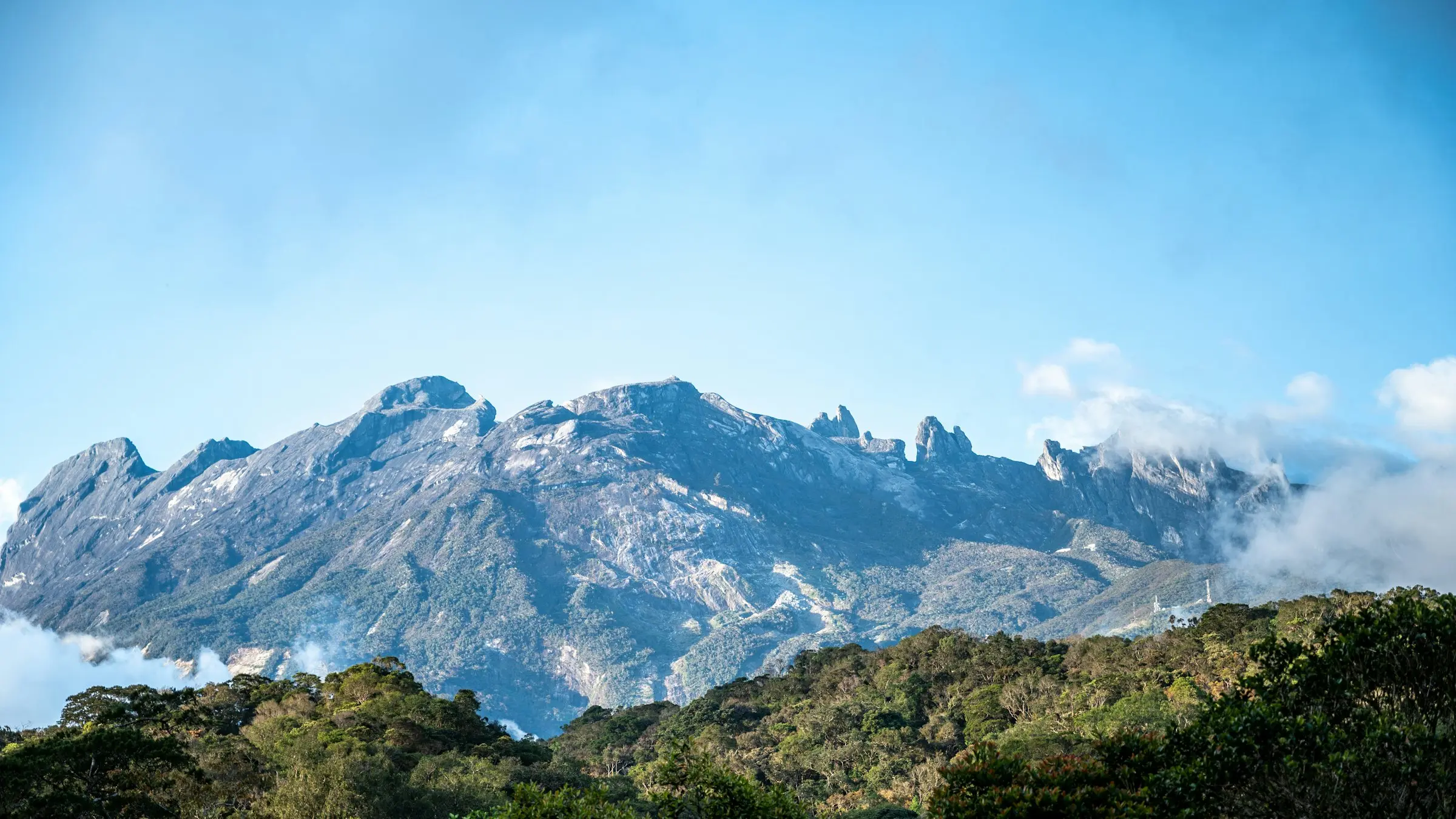 Mount Kinabalu rising above the clouds