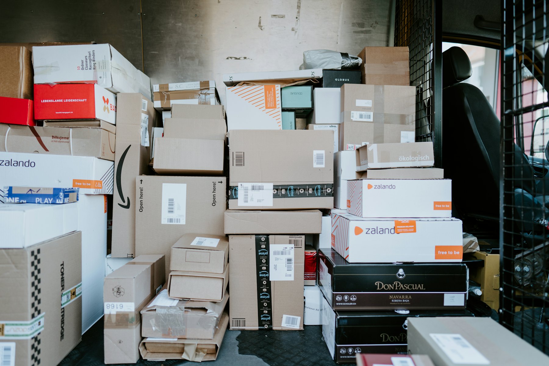 Stacked parcels inside a delivery van